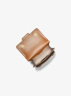 Bolsa a tiracolo em pele com logótipo Heather extrapequena | Michael Kors [PT]