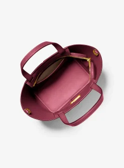 Bolsa a tiracolo em pele granulada e com logótipo exclusivo Flora média | Michael Kors [PT]