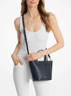 Bolsa a tiracolo em pele granulada e com logótipo exclusivo Flora média | Michael Kors [PT]