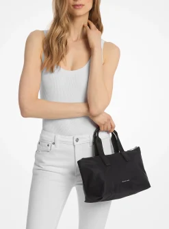 Mala tote dobrável e reversível com logótipo exclusivo estampado Tanner pequena | Michael Kors [PT]