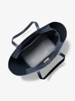 Mala tote em pele com logótipo exclusivo Flora grande | Michael Kors [PT]