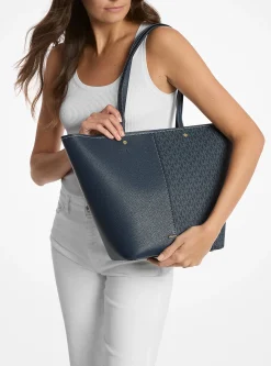 Mala tote em pele com logótipo exclusivo Flora grande | Michael Kors [PT]