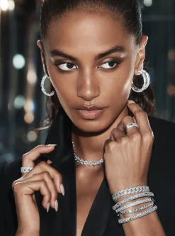 Pulseira rígida com logótipo e incrustações em prata de lei banhada a metal precioso | Michael Kors [PT]